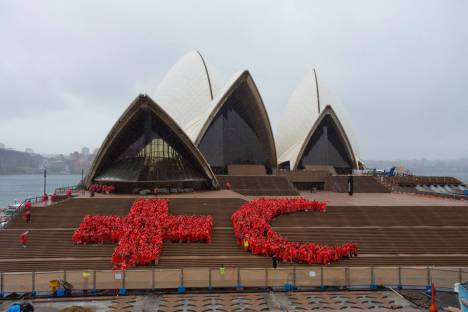 Red Cross volunteers gathered outside the Sydney Opera House