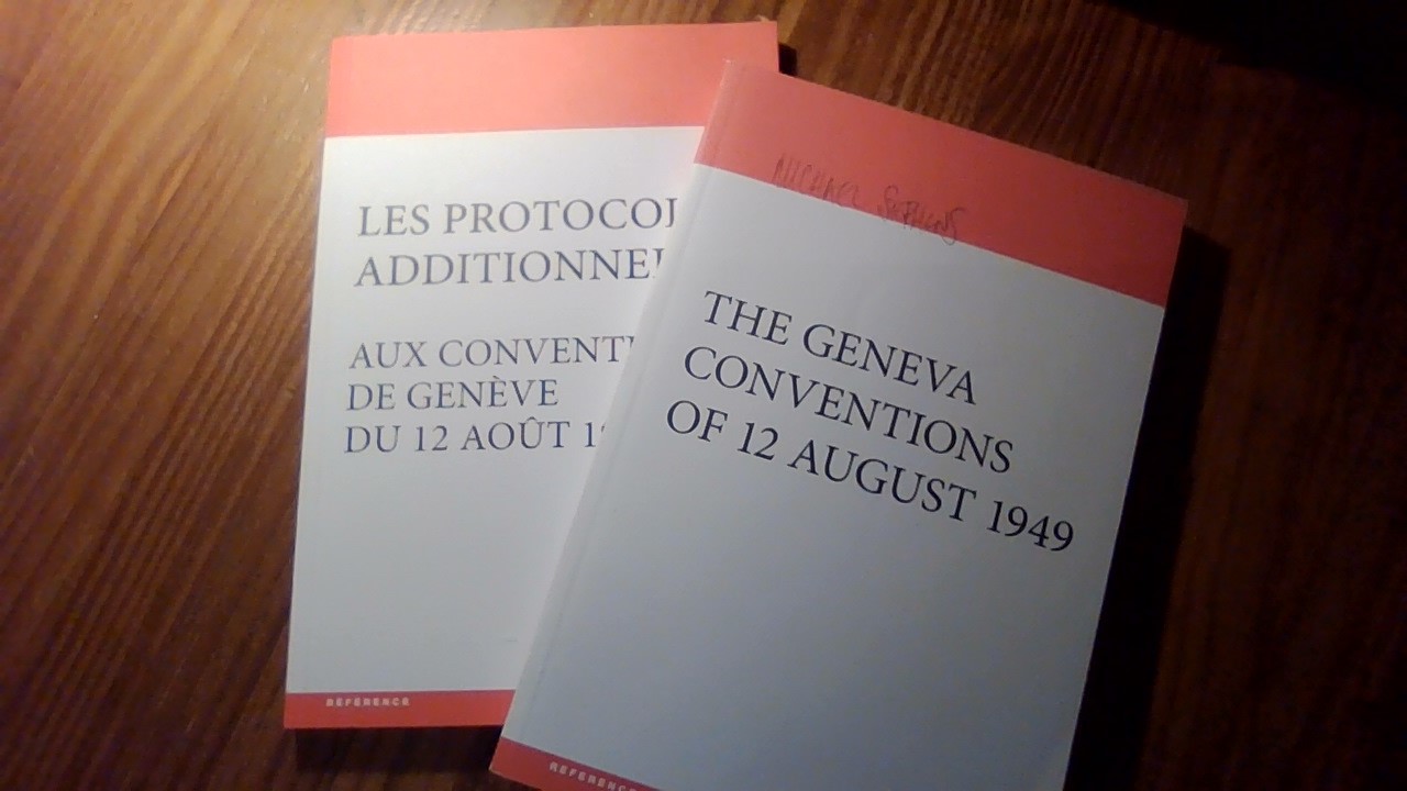 The Geneva Conventions (1949) and the Additional Protocols to the Geneva Conventions (1977) (it looks blurry – we won’t include it)